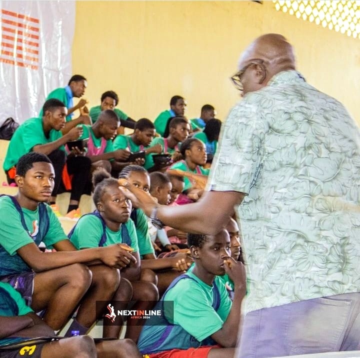 Group wellbeing and safety talk with young participants seated in a community setting