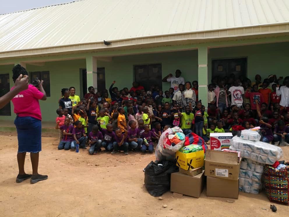 Relief supplies arranged during a community outreach visit with children and families