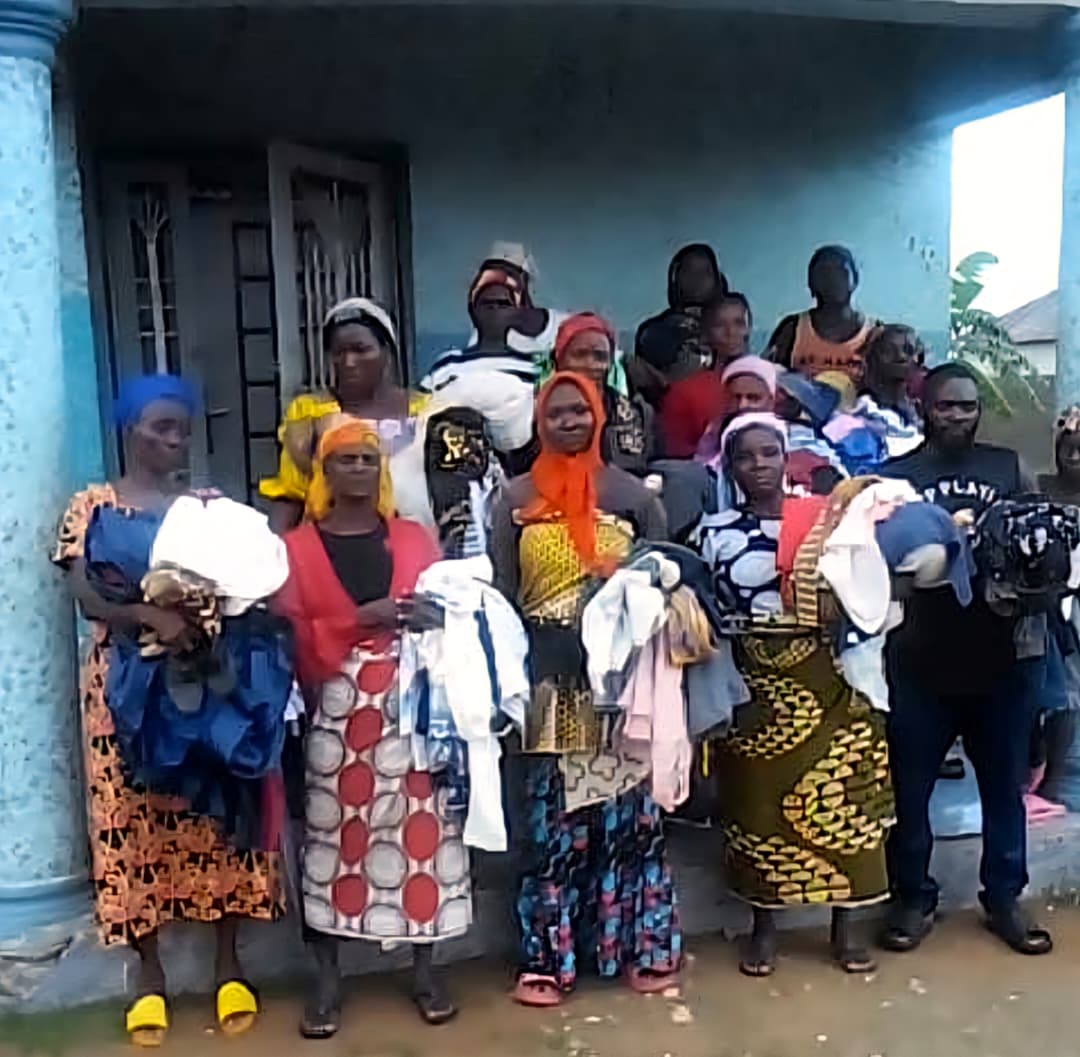 Community members gathered during an IDP and outreach service moment